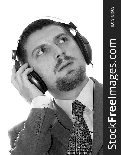 An image of businessman listening to music. An image of businessman listening to music