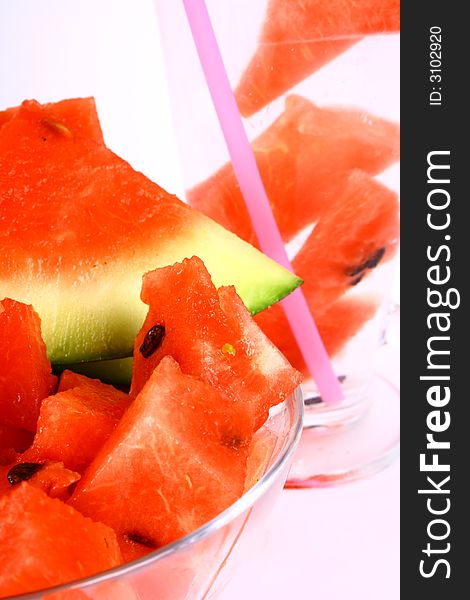 Background of brightly lit red watermelon slices. Background of brightly lit red watermelon slices.