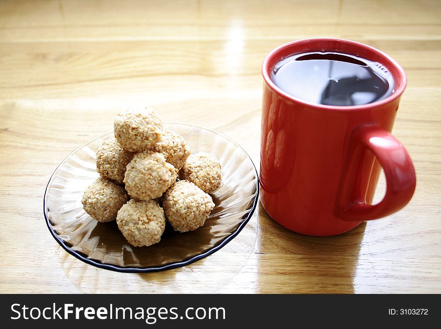 Brown ball cookies and coffee