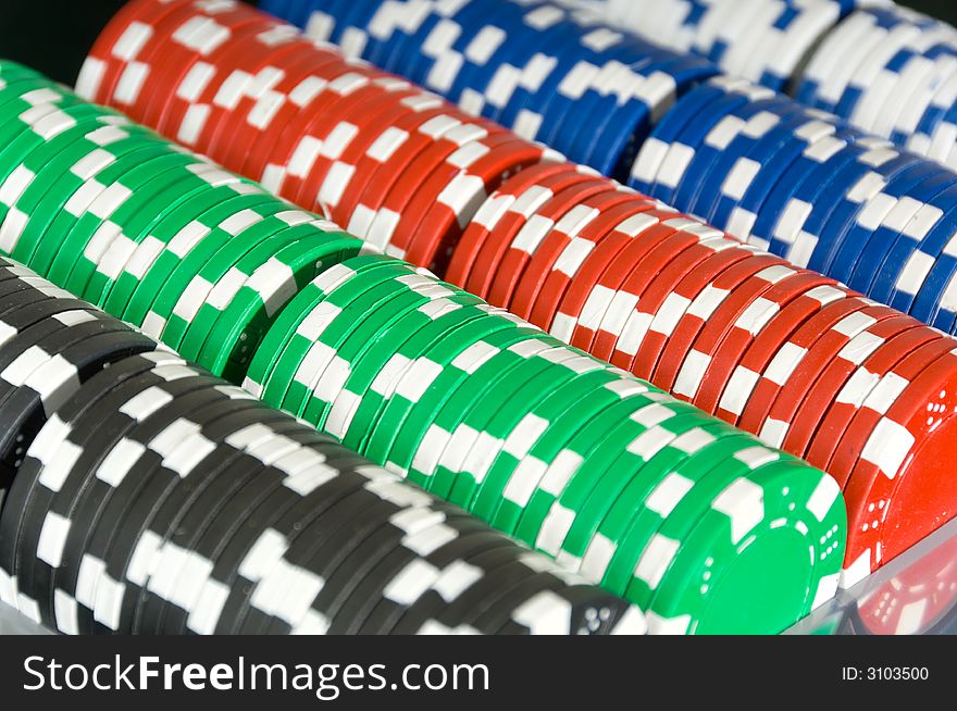 Trays of several denominations of poker chips. Trays of several denominations of poker chips