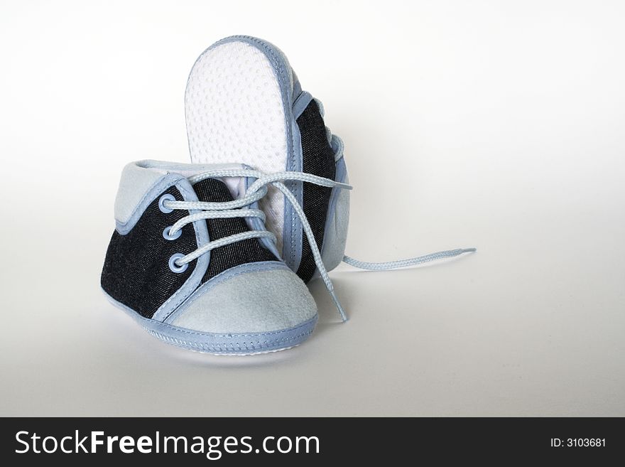 Blue baby footwear isolated on white