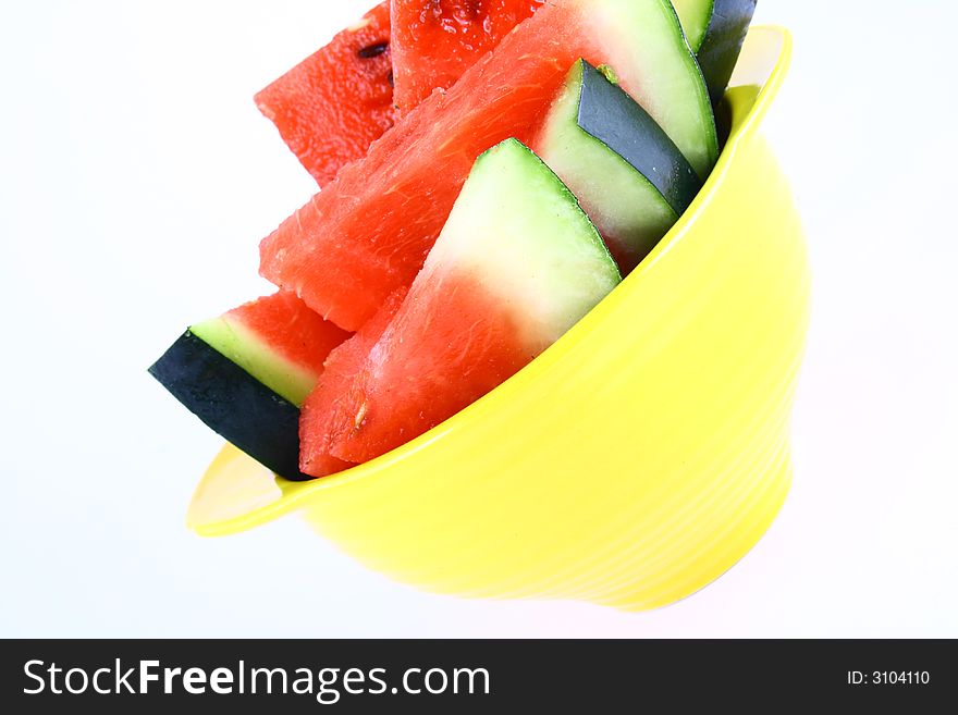 Background of brightly lit red watermelon slices.