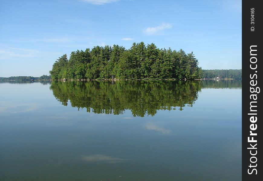 This photo was taken early in the morning while kayaking on Three Mile Pond in South China, Maine. This photo was taken early in the morning while kayaking on Three Mile Pond in South China, Maine.