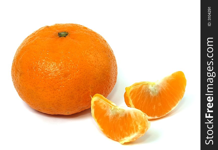 Isolated lobules of tangerine with clipping path. Shadow is not included with the clipping path.