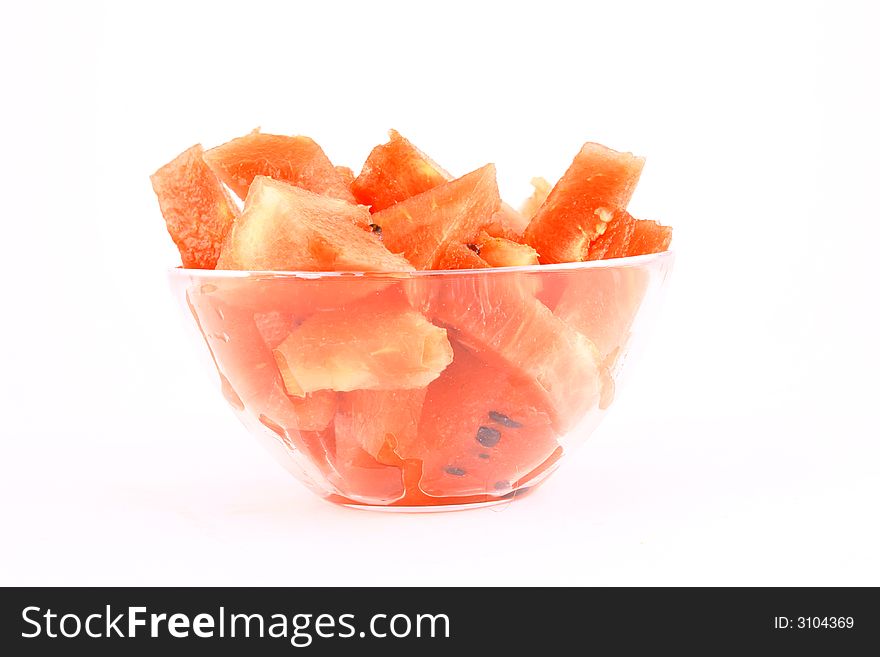 Background of brightly lit red watermelon slices.