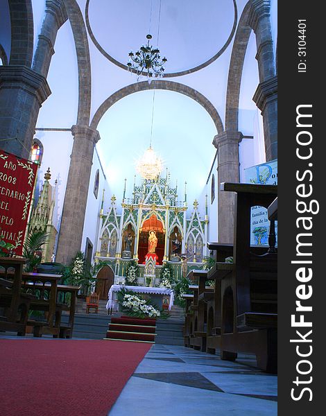 Altar of Candelaria Church in Canary Islands a place of pilgrimage, blue hue version. Altar of Candelaria Church in Canary Islands a place of pilgrimage, blue hue version