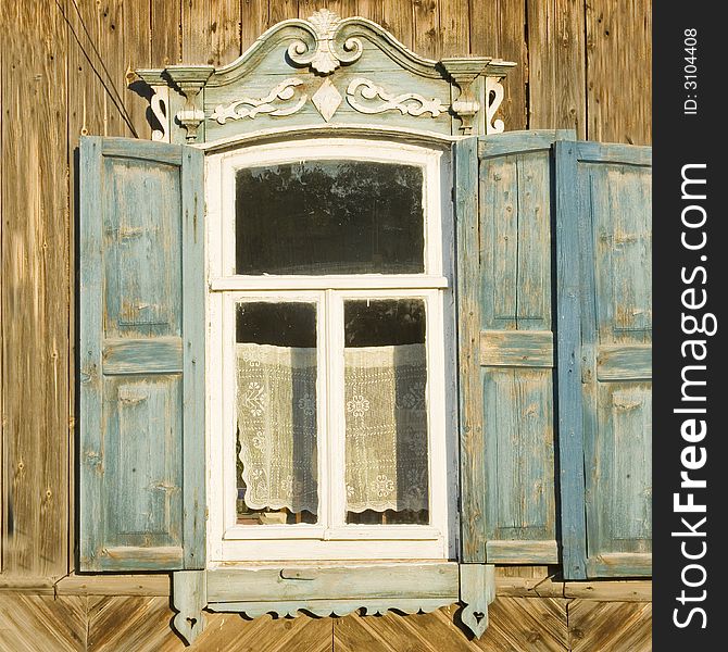 Traditional russian window with shutter from Engels