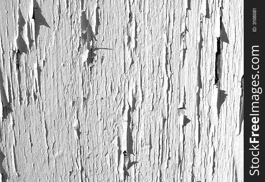 An image of some painted wood that is cracked,it would make an interesting texture background. An image of some painted wood that is cracked,it would make an interesting texture background.