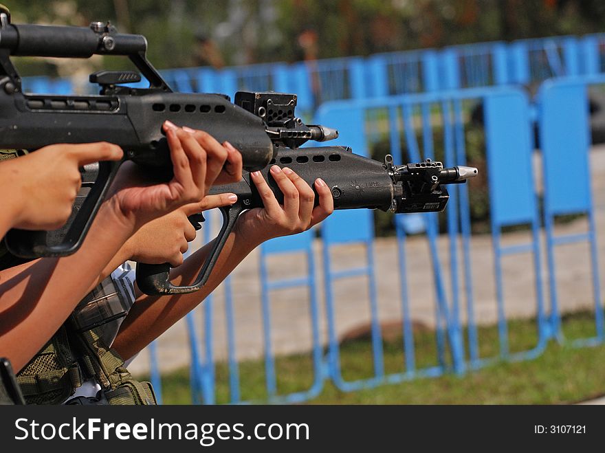 Man testing the rifle in the camps