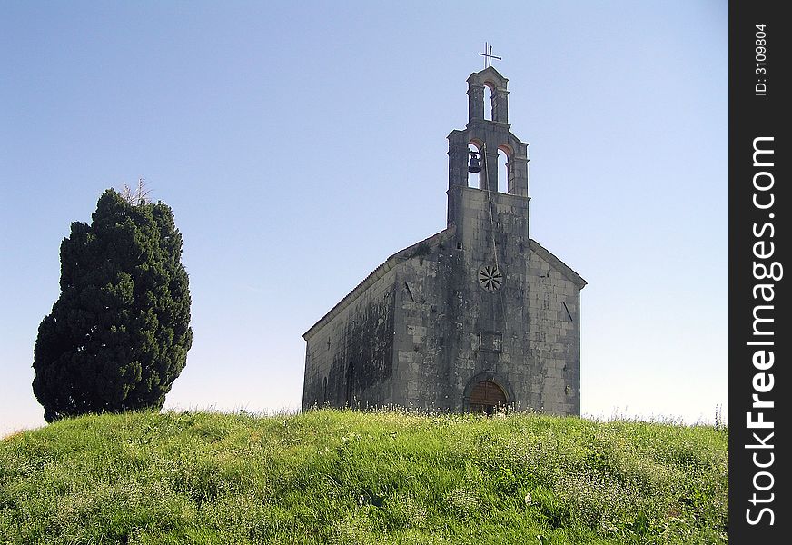 Old church with steeple and bell
