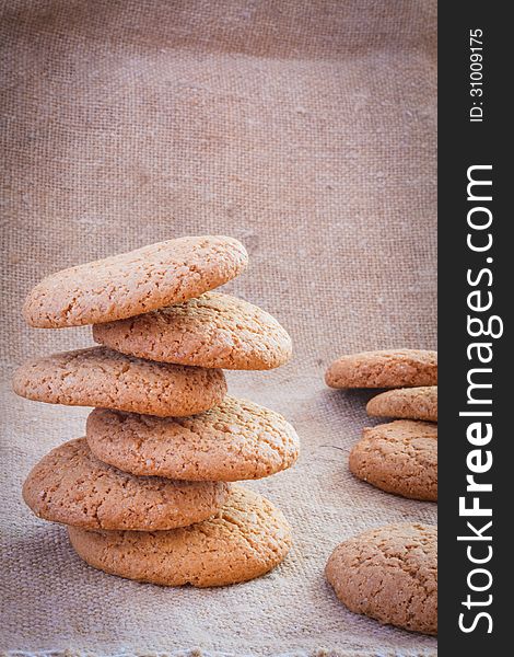 Stacked Brown Cookies On Rustic Background