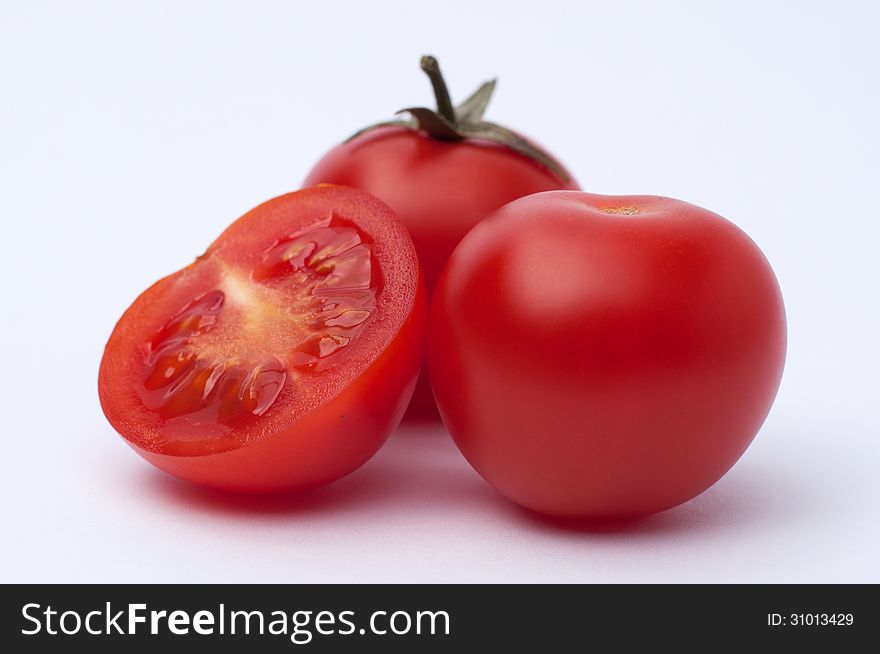 Tomato on a white background. Tomato on a white background