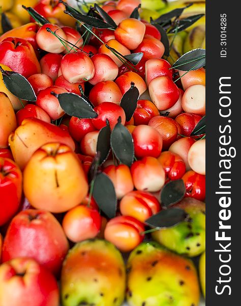 Marzipan shaped into fruits. shallow depth of field. Marzipan shaped into fruits. shallow depth of field