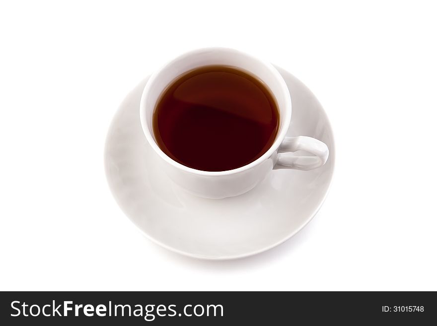 Cup of black tea on white background