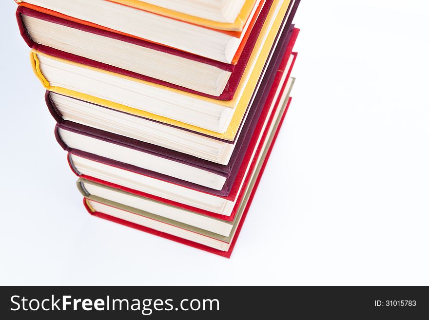 Stack of books on a white background