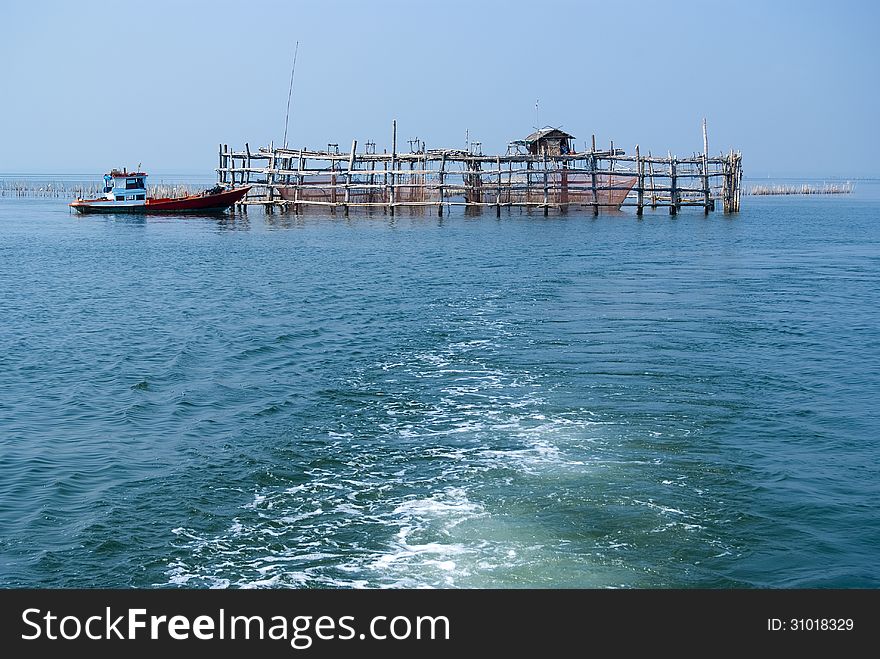 Trap net/stake trap at the mouth of the Mae Klong river to the Gulf of Thailand in Samutsongkram. Trap net/stake trap at the mouth of the Mae Klong river to the Gulf of Thailand in Samutsongkram