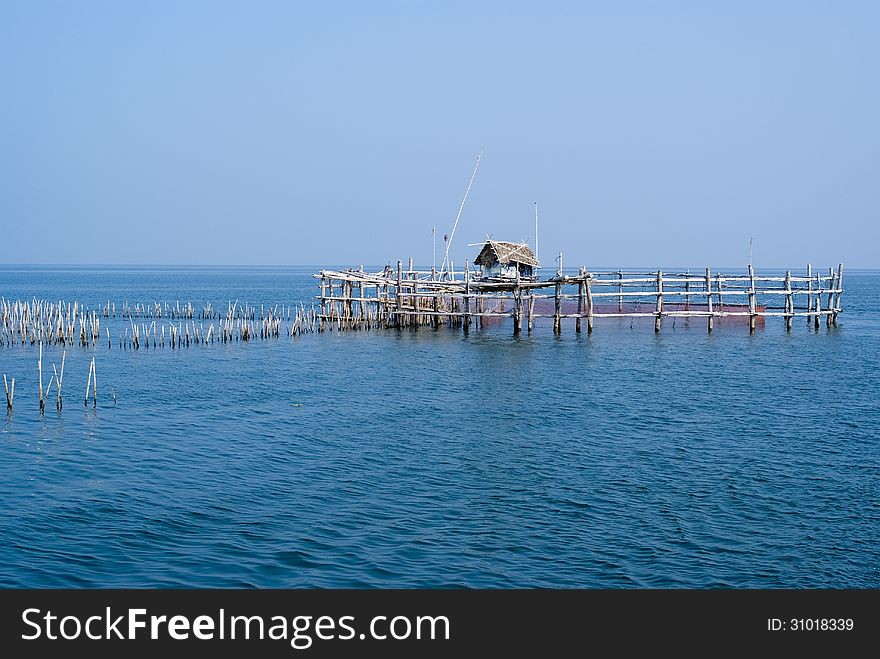 Trap net/stake trap at the mouth of the Mae Klong river to the Gulf of Thailand in Samutsongkram. Trap net/stake trap at the mouth of the Mae Klong river to the Gulf of Thailand in Samutsongkram