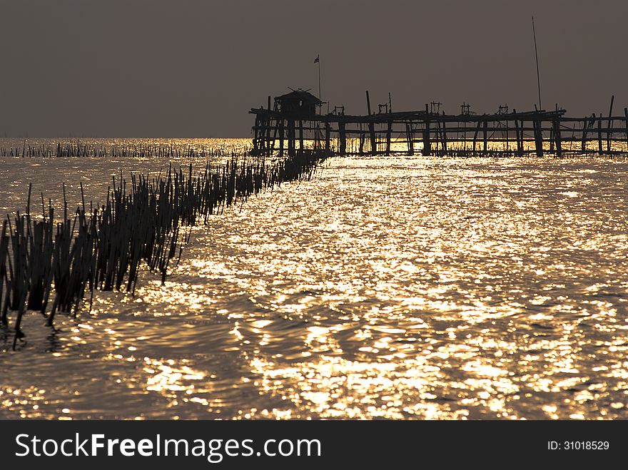 Trap net/stake trap at the mouth of the Mae Klong river to the Gulf of Thailand in Samutsongkram. Trap net/stake trap at the mouth of the Mae Klong river to the Gulf of Thailand in Samutsongkram