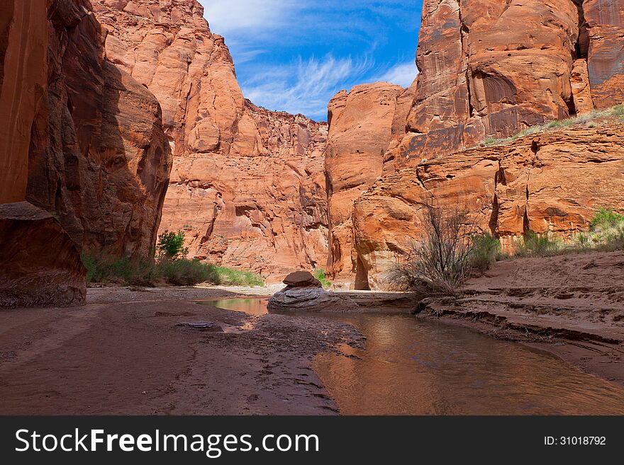 The Paria Canyon is located in Arizona and Utah, and is a 38 mile long canyon trip by means of backpacking. One makes thousands of stream crossings in this spectacular area, until the canyon widens out and ends in Lee's Ferry, Arizona.