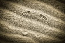 Two Footprints In Sand On The Desert Beach Stock Photos Two Footprints In Sand On The Desert Beach Stock Photos