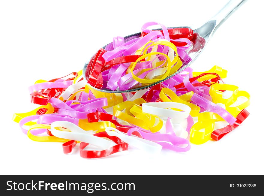 Close up photo image of a group of assorted rubber bands. Close up photo image of a group of assorted rubber bands