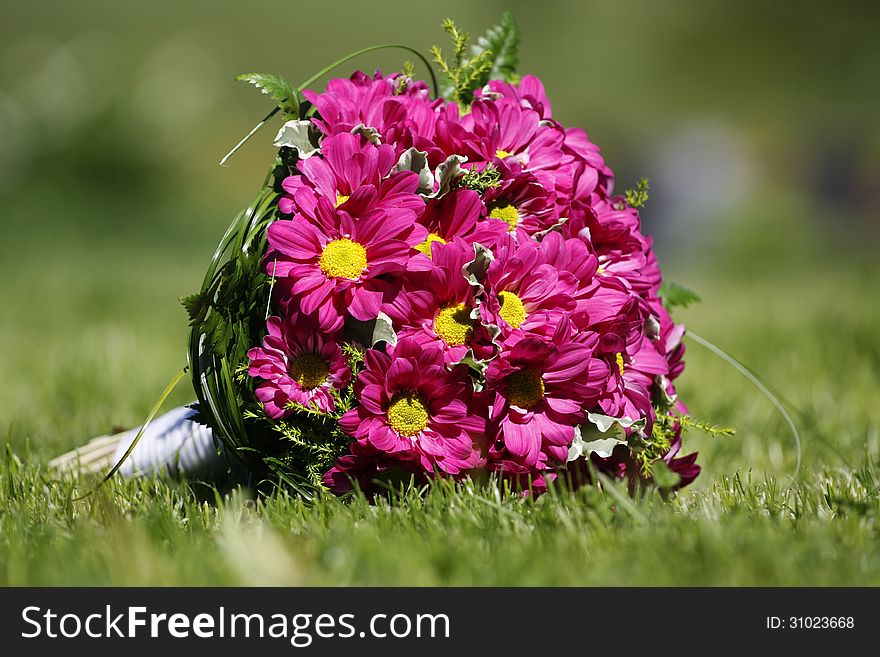 Wedding bouquet on the lawn