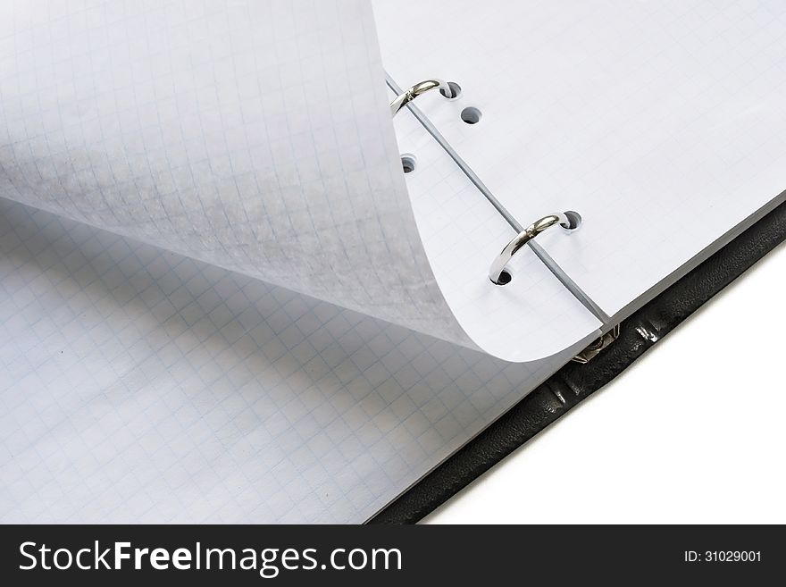 Blank opened notebook with squared sheets on white background. Blank opened notebook with squared sheets on white background