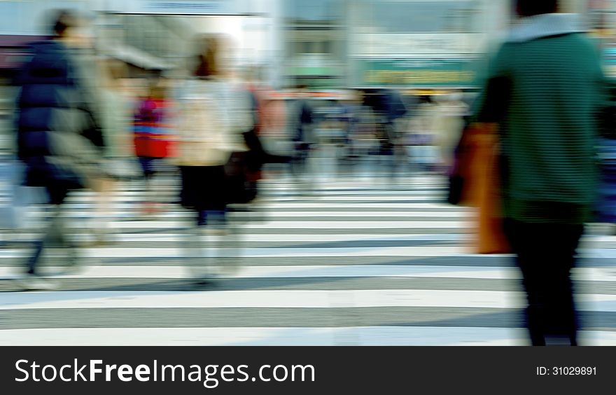 Tokyo in a hurry on a crosswalk. Tokyo in a hurry on a crosswalk