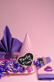 Pink And Purple Theme Party Table Setting Decorations - Vertical. Stock Photo Pink And Purple Theme Party Table Setting Decorations - Vertical. Stock Photo