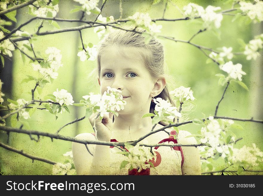 Beautiful blonde girl playing in the park. Beautiful blonde girl playing in the park