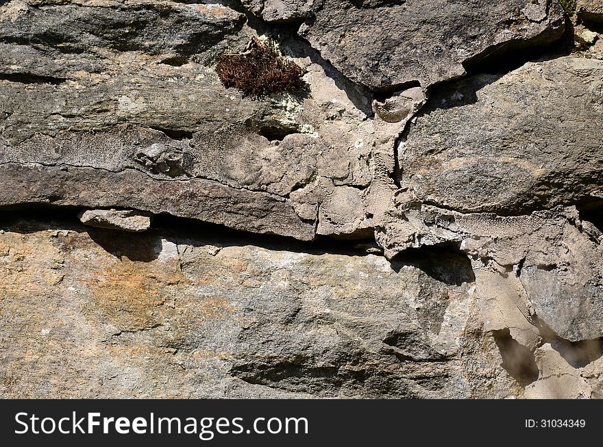 Old Stone wall with shadows