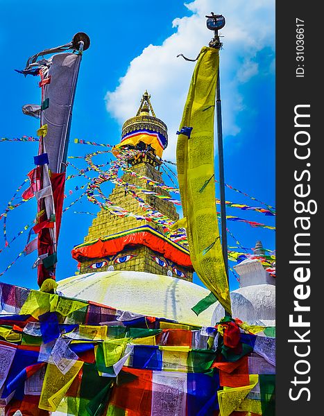 Bouddhanath stupa and buddhist flags