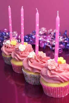 Pink Brithday Cupcakes With Polka Dot Candles - Vertical. Royalty Free Stock Photo Pink Brithday Cupcakes With Polka Dot Candles - Vertical. Royalty Free Stock Photo