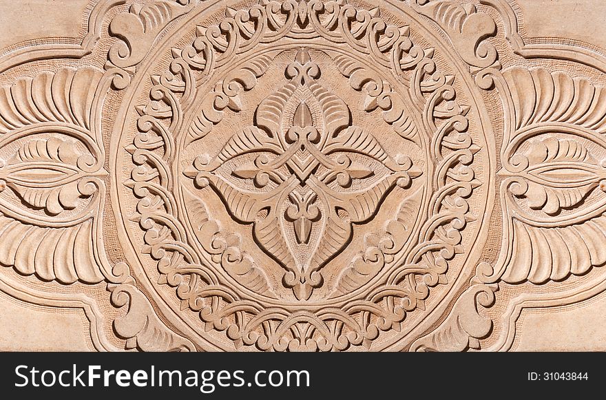 Abstract background of carved stone wall. Abstract background of carved stone wall