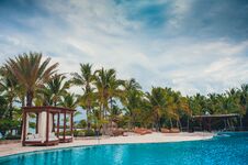 Outdoor Resort Pool Swimming Pool Of Luxury Hotel. Swimming Pool In Luxury Resort Near The Sea. Tropical Paradise. Swimming Pool Stock Photography