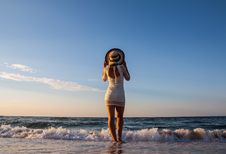Young Woman Standing In Sea Looking Ahead Royalty Free Stock Photos Young Woman Standing In Sea Looking Ahead Royalty Free Stock Photos