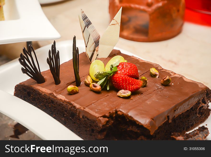 Chocolate cake on a white plate