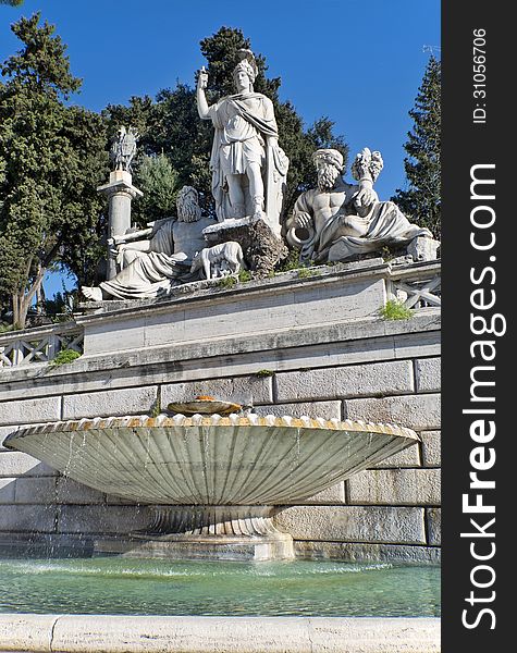 Fountain at the foot of statue of Romulus and Remus, the founders of Rome, Piazza del Popolo, Rome, Italy