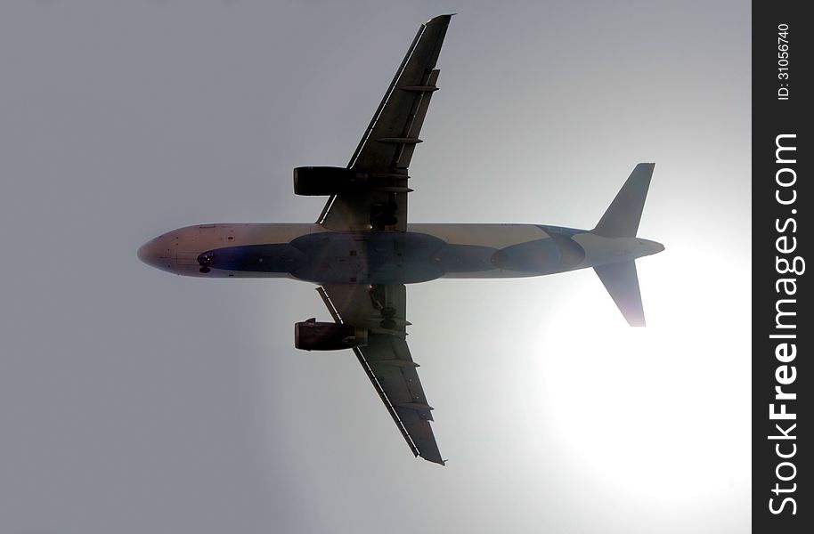 Airplane at takeoff seen from the bottom. Airplane at takeoff seen from the bottom