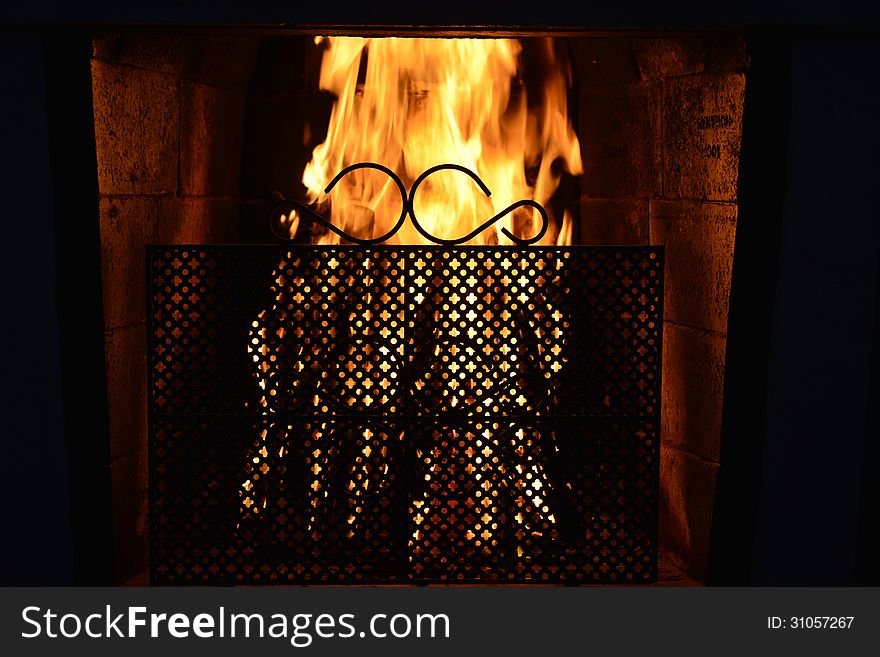 Fireplace burns with full flame