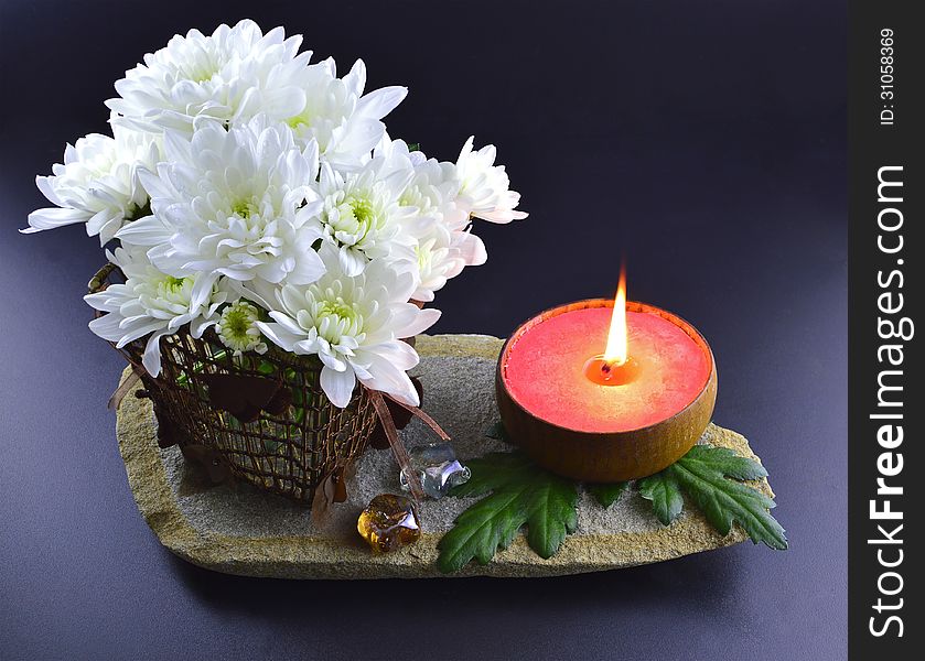 White flower with candle