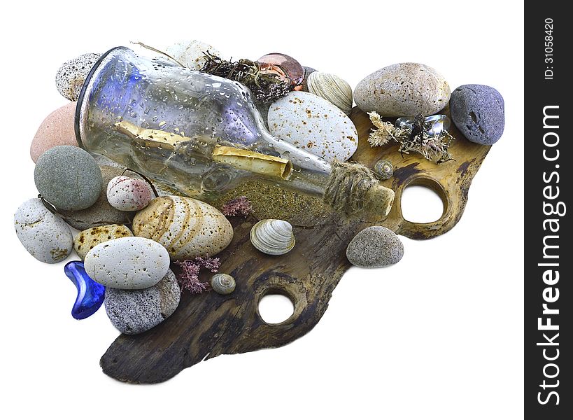 Glass bottle with letter inside on stones and shells isolated. Glass bottle with letter inside on stones and shells isolated