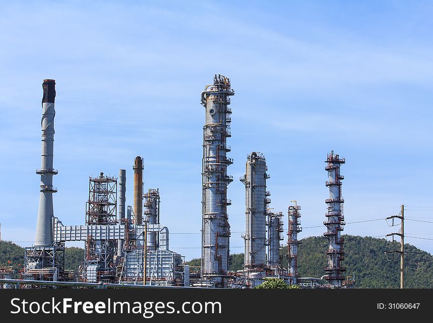 Petrochemical and oil plant with blue sky. Petrochemical and oil plant with blue sky.