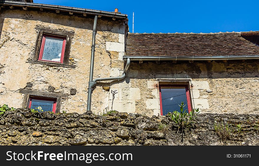 Facade of the old residential house in Chatillon-sur-Indre, France.