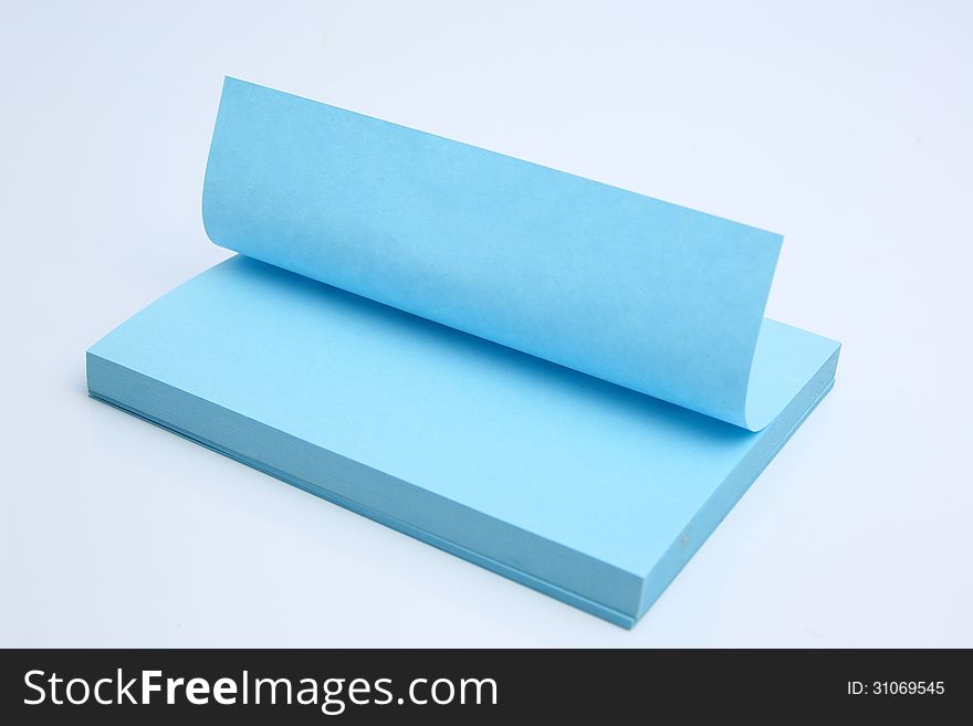 Blue sticky note isolated on a white background