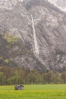 Wooden Cottage In Background Big Waterfall - Franc Stock Photo Wooden Cottage In Background Big Waterfall - Franc Stock Photo