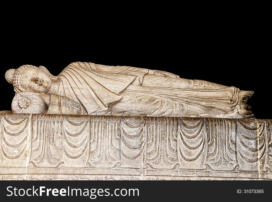 Statue of sleeping Buddha in a Buddhist Temple.