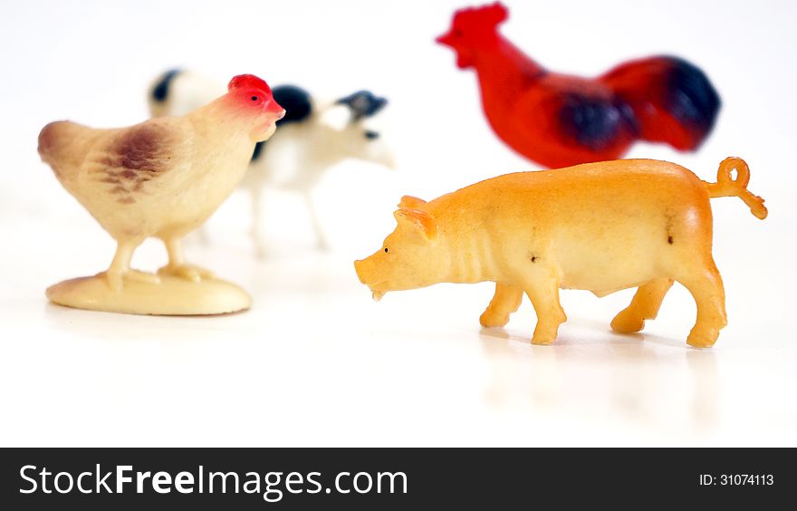 animal farm toys in white background