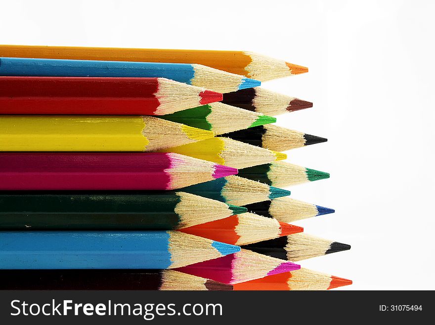 Different color pencils with white background