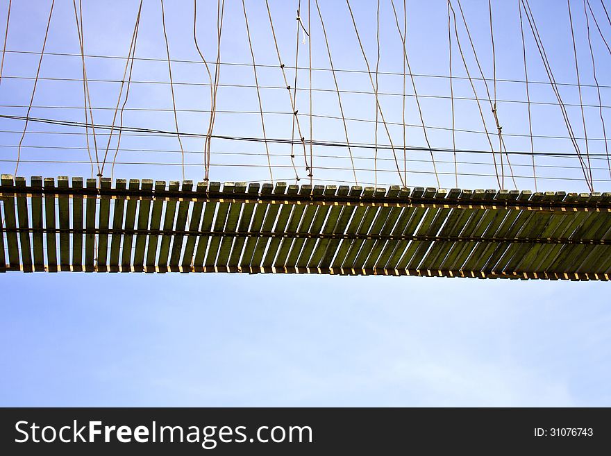 Rope bridge and sky in park